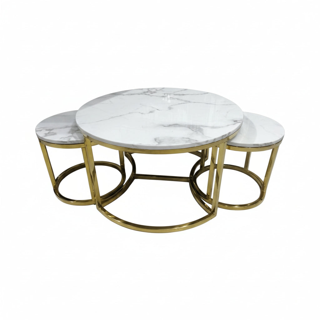 Round marble coffee table with gold metal base on a white background