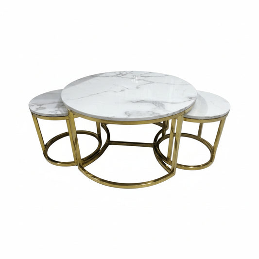 Round marble coffee table with gold metal base on a white background